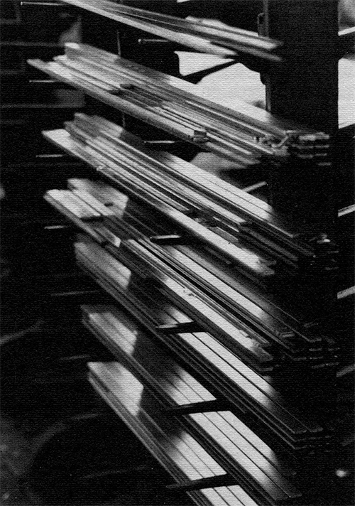 Photograph of Park Avenue and News Goth Condensed on sticks on racks.