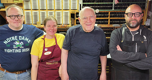 Photograph of Terrence Chouinard, Val Lucas, instructor Rich Hopkins, 
								and Kris Branco