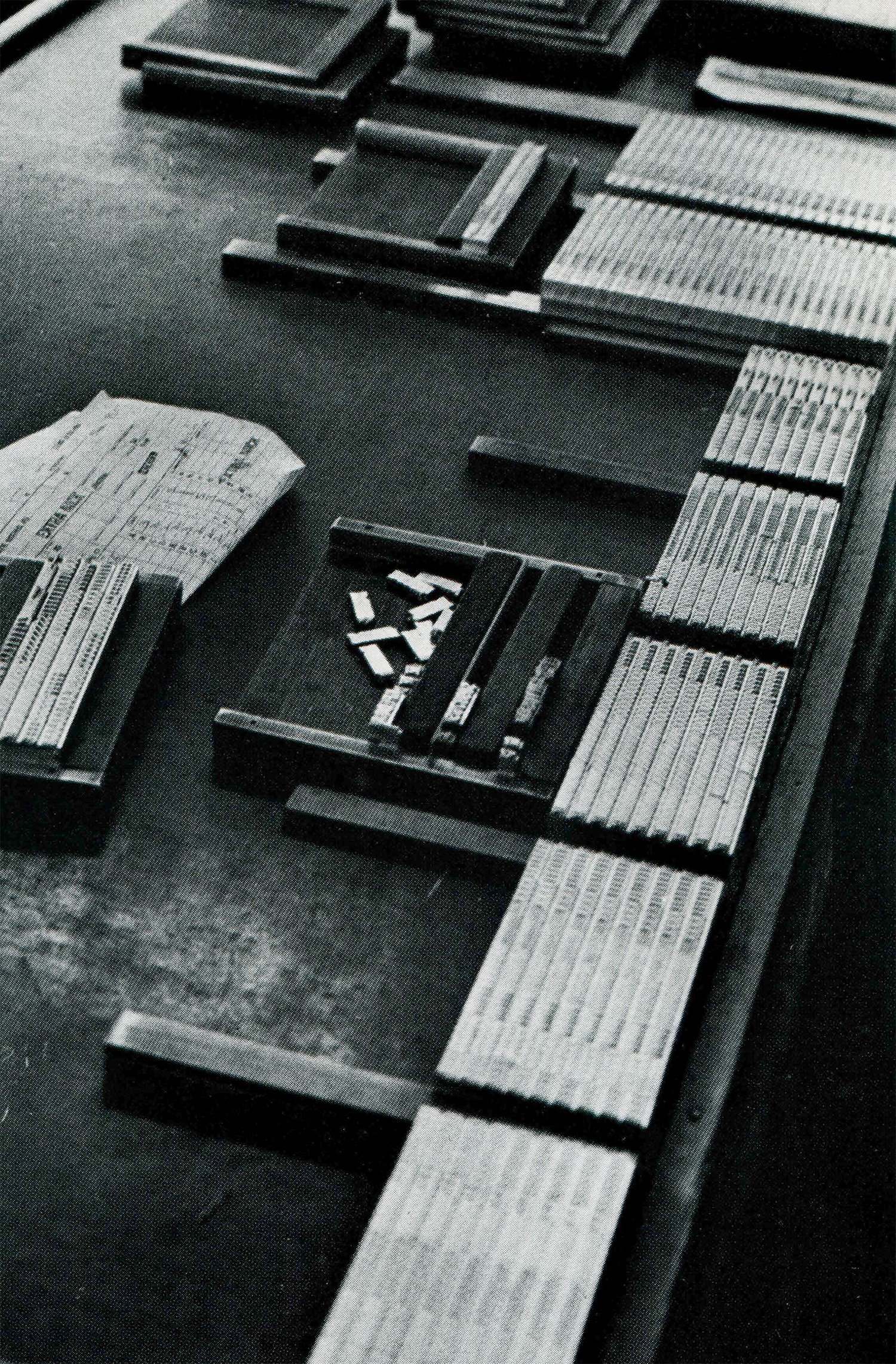 Loose type surrounded by individual fonts on a large countertop