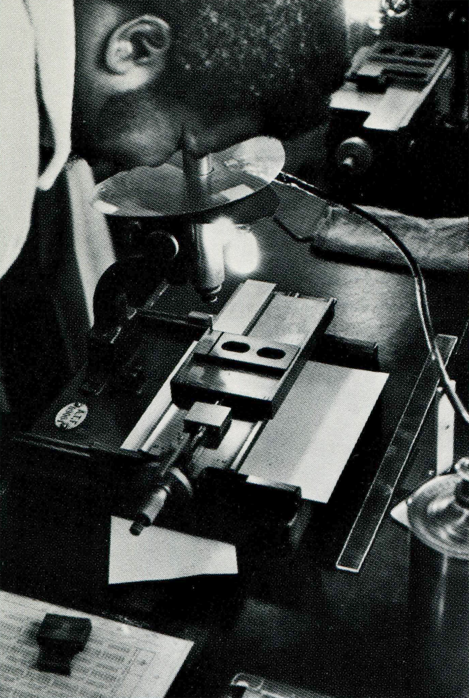ATF member Willie Parker peers through a microscope