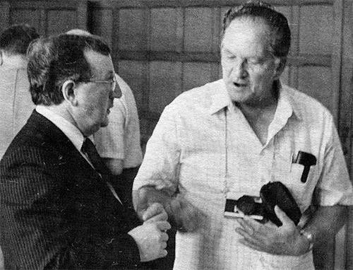 Photograph of David Belfort in discussion with Paul Quyle